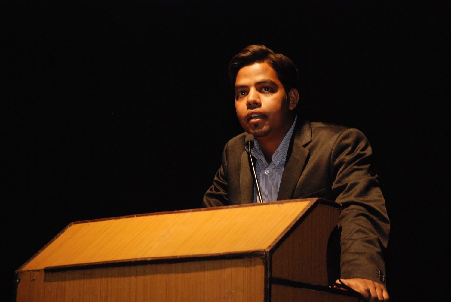 Sandip Wankhede speaking at a podium