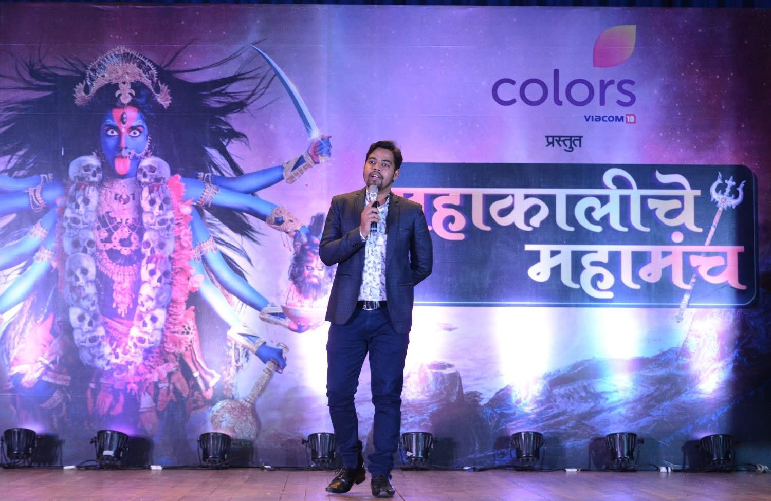 Sandip Wankhede speaking on stage at a Colors event